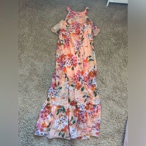 Flora orange dress with color accents of purple, blue, green and pink